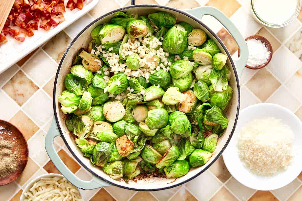 Brussels sprouts browning with fresh garlic