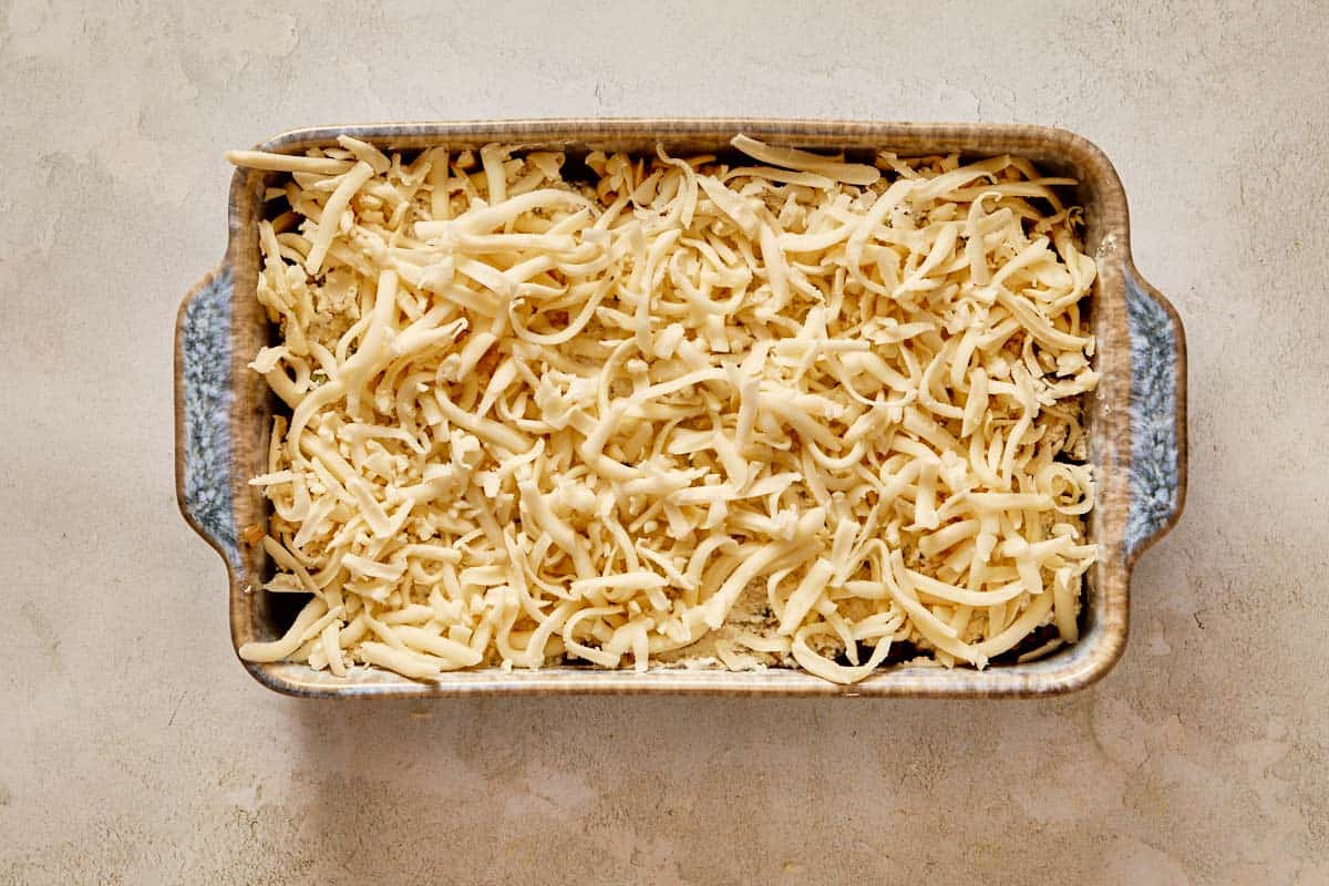 Layer topped with shredded mozzarella before baking.