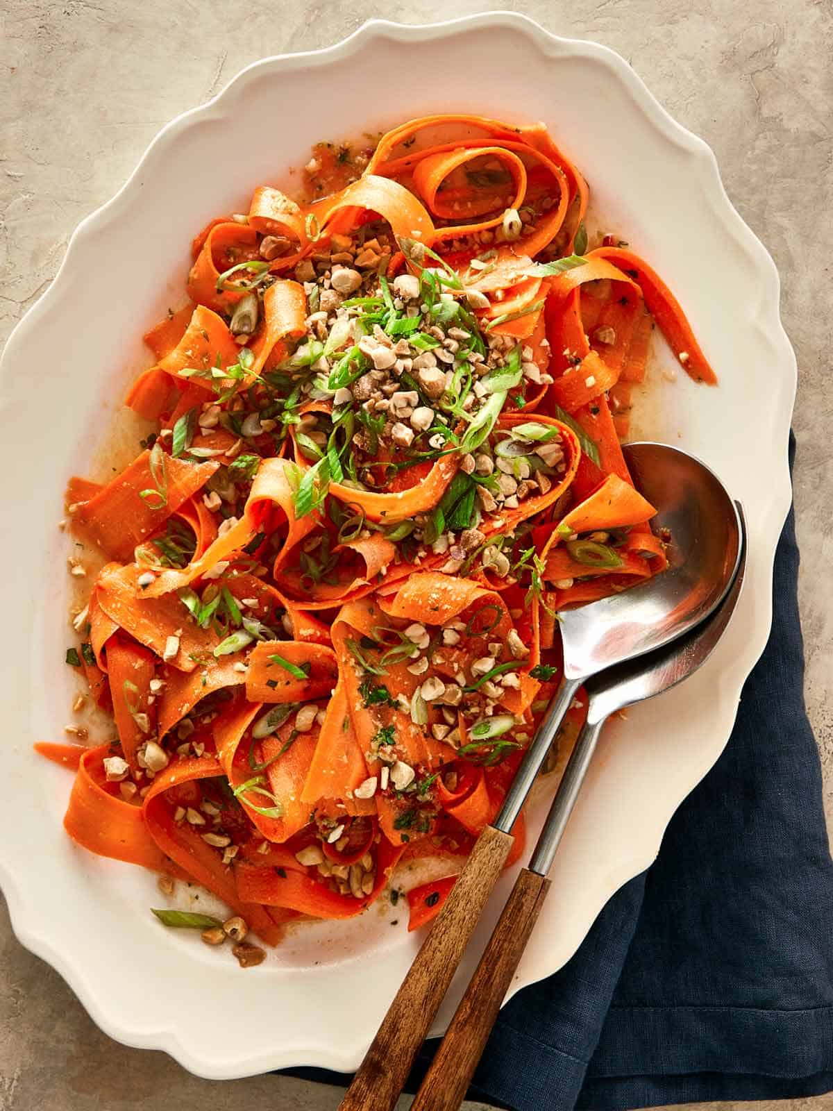 Carrot Salad top down shot in a bowl with a spoon in it