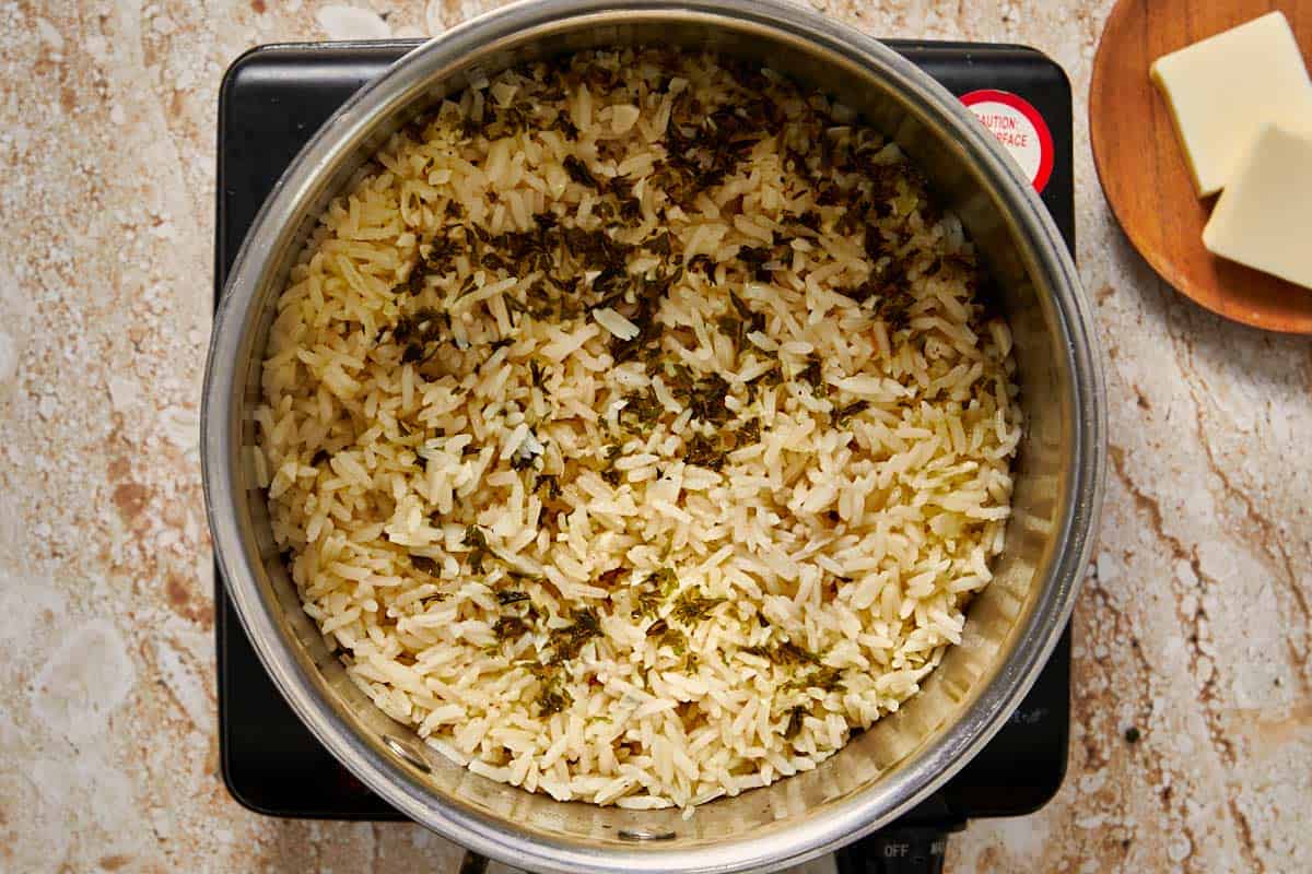 rice being cooked in a pot