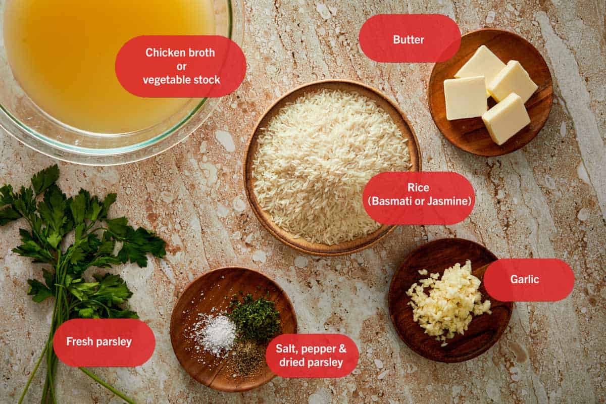 top down photo of a collection of ingredients used in garlic butter rice