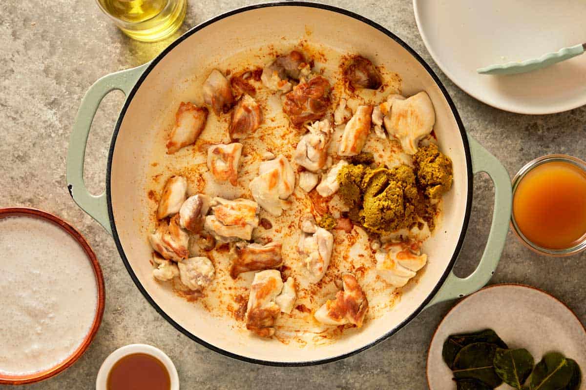 top down shot of a pan with chicken thigh cooked