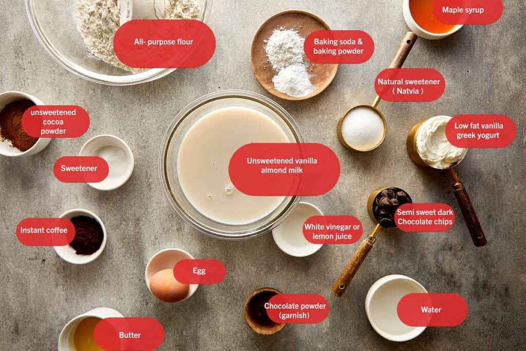 a top down ingredients shot of the pancake recipe of what is needed. all the ingredients are in individual bowls.