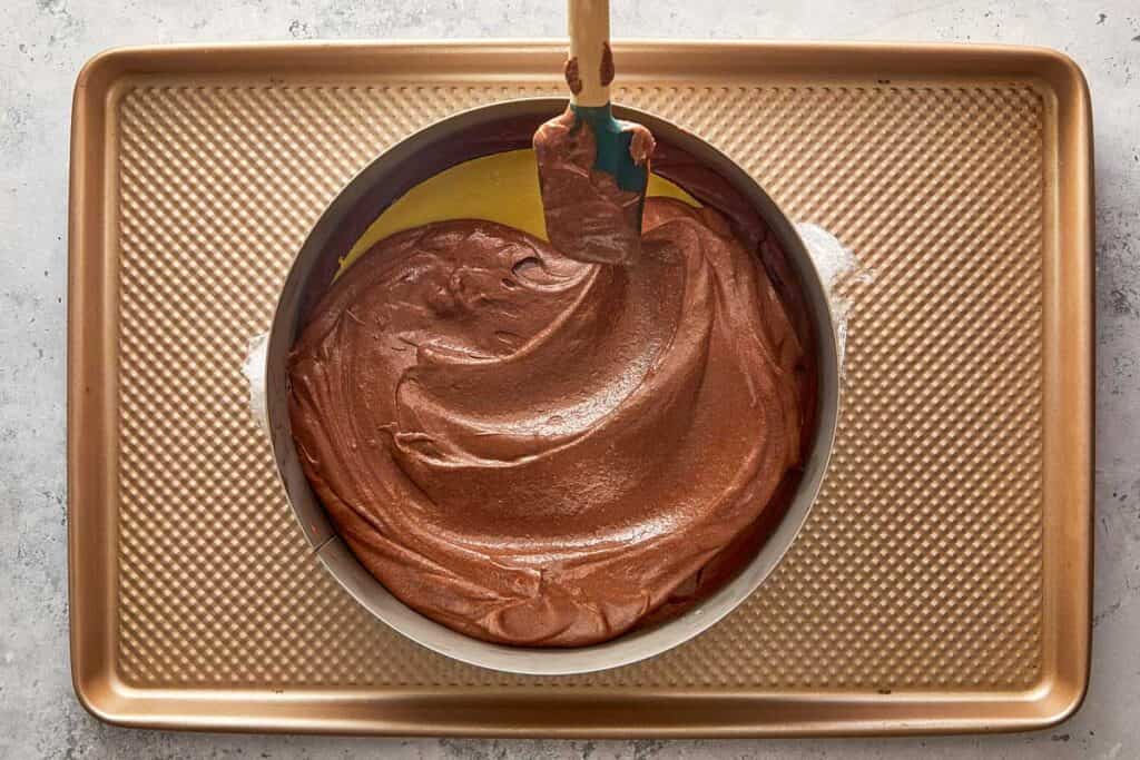 spreading the mousse chocolate over the custard disk