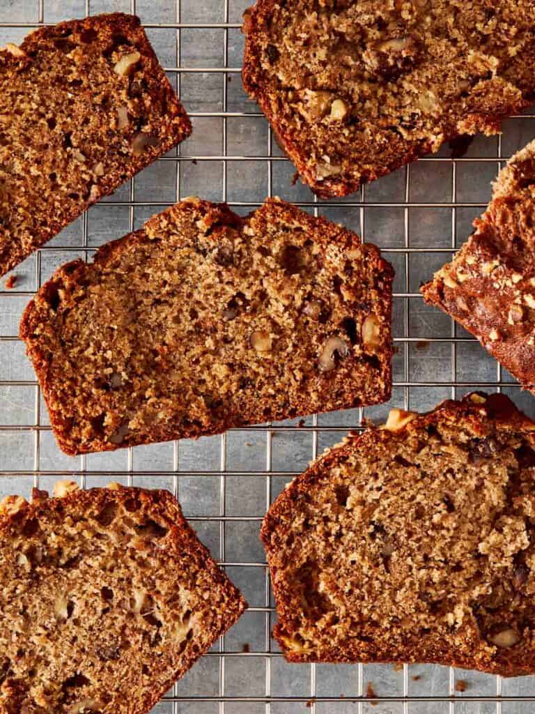 a top down view of slices of banana bread resting on top of a tray - 11