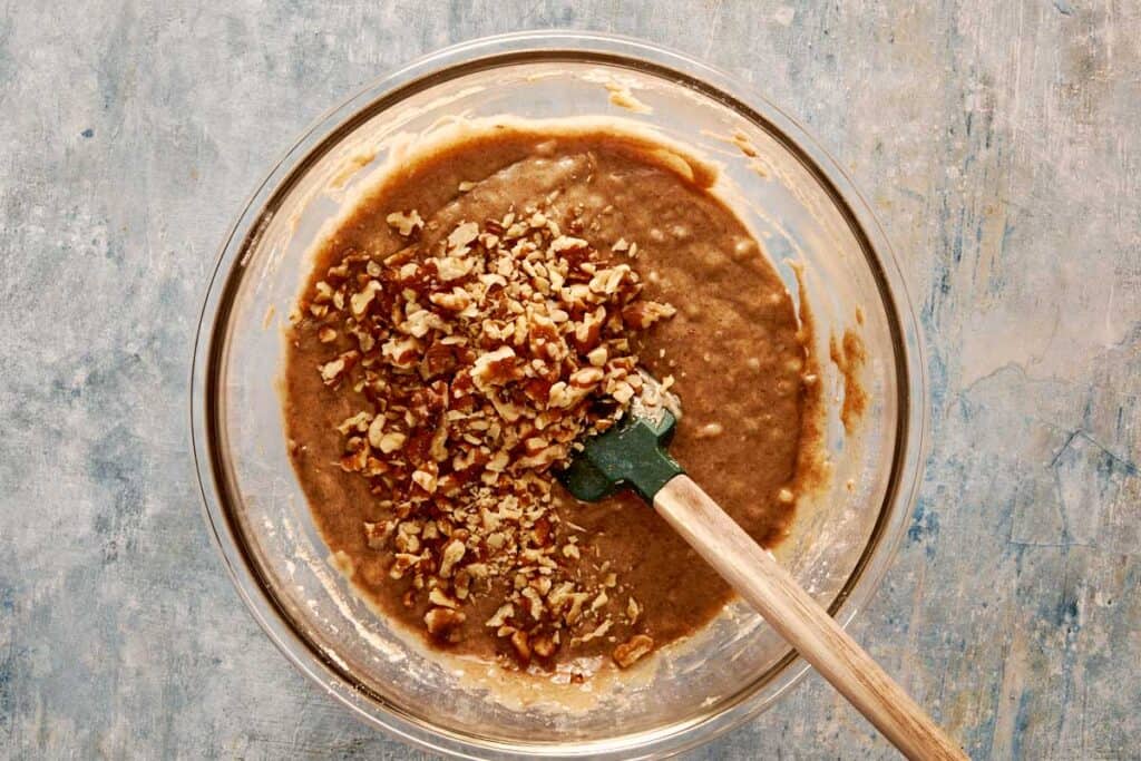 a top down view of all the ingredients in a large glass bowl being mixed together - 8