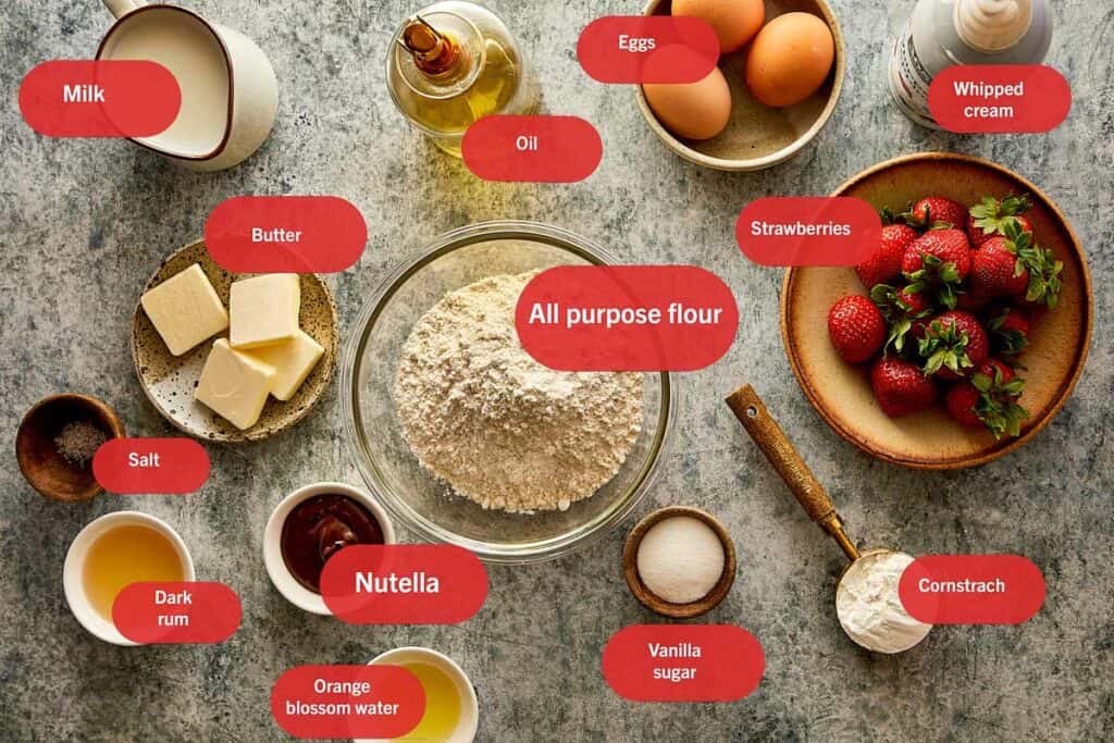 all the ingredients needed to make strawberry and nutella crepes in bowls. - 4