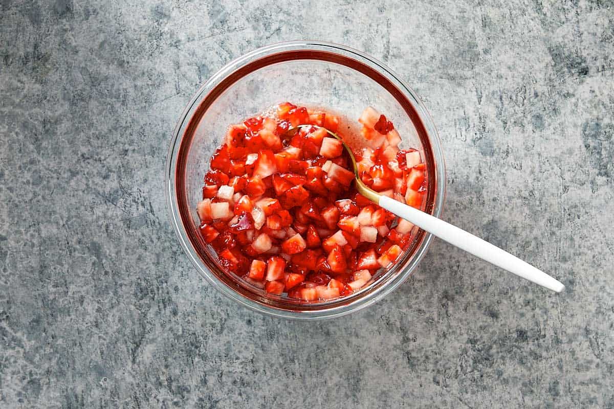 Top overview of strawberry salsa in a bowl.