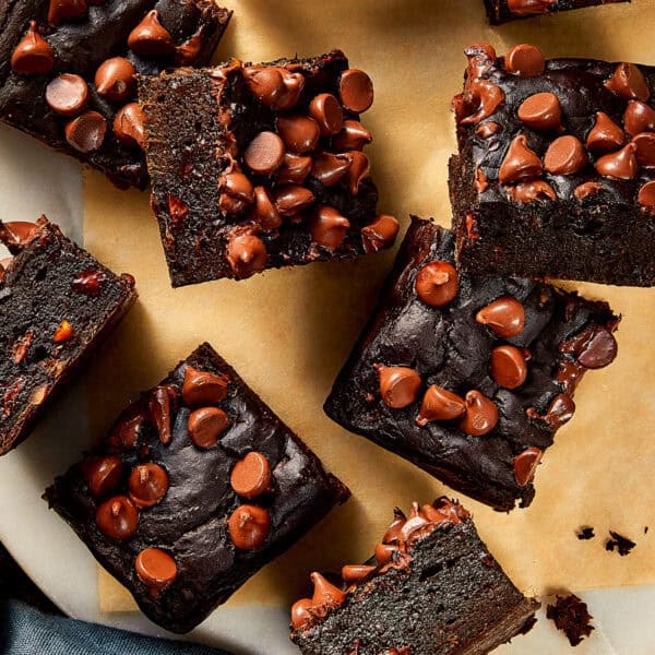 Top view of pieces of Sweet Potato brownies in a beige table
