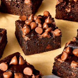 Sweet potato brownies side view of a few with chocolate chips on top