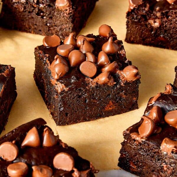 Sweet potato brownies side view of a few with chocolate chips on top