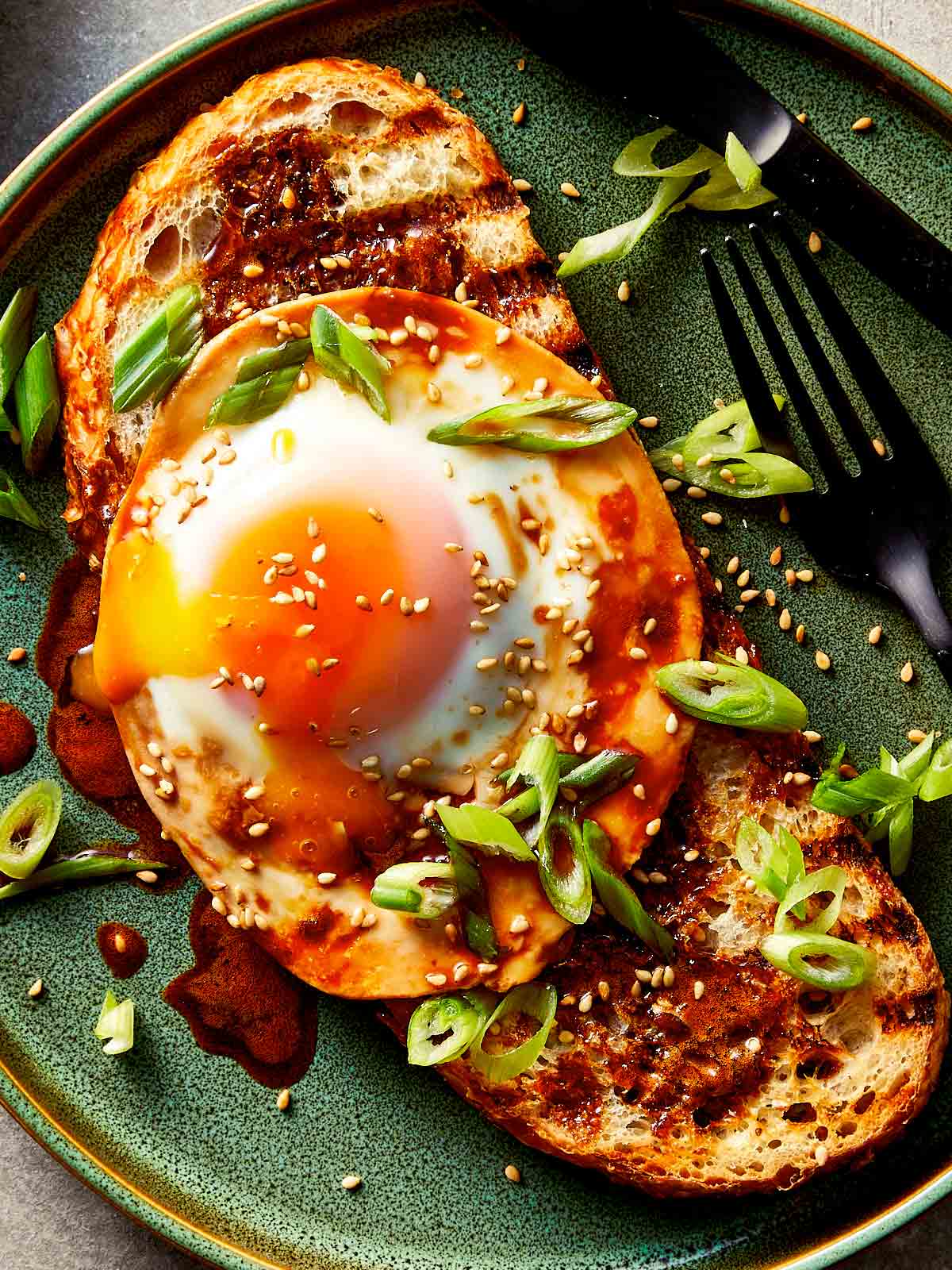 Close up of Teriyaki Poached egg ready in a toast