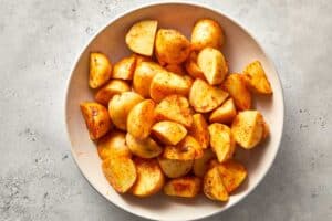 Top overview of cooked potatoes in a bowl