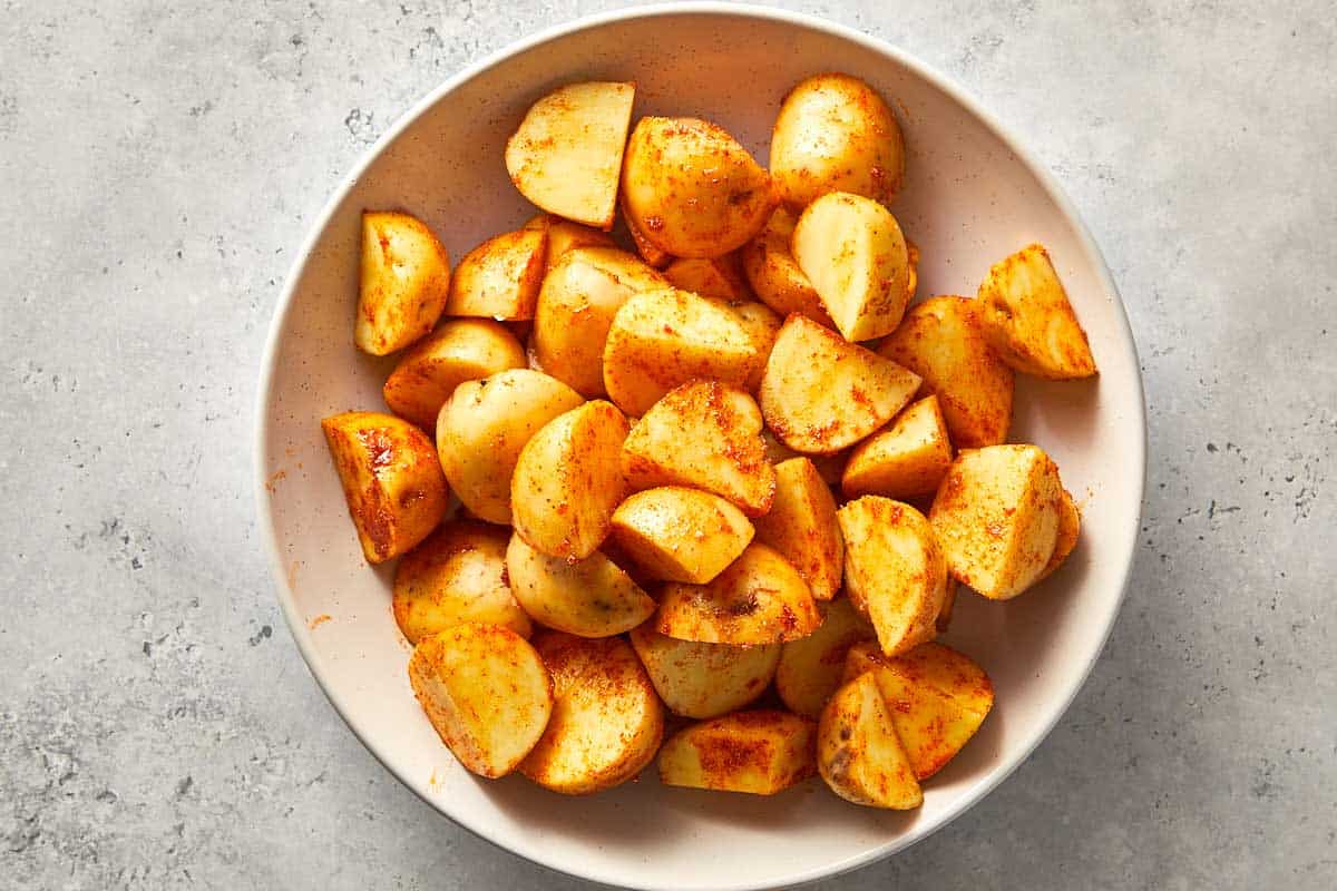 Top overview of cooked potatoes in a bowl