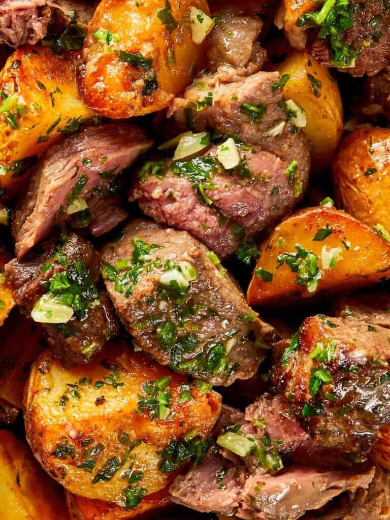 close up of steak bites and potatoes