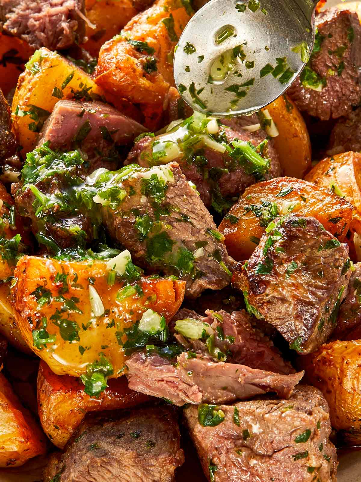 close up of steak bites and potatoes