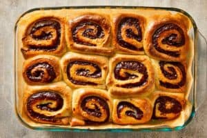Nutella rolls baked until golden brown in a baking dish