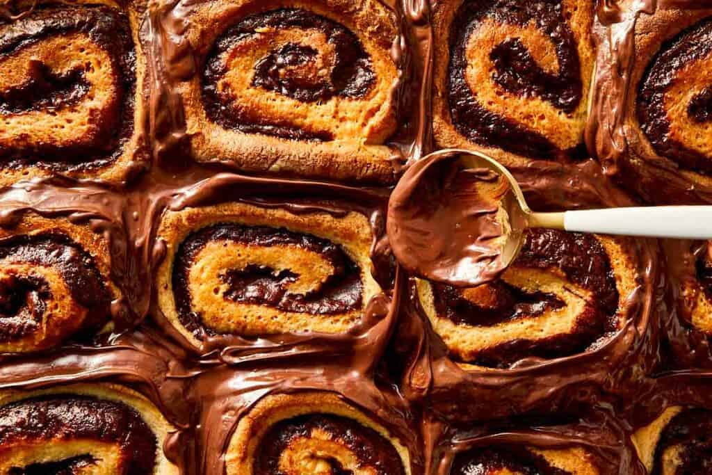 Close-up of Nutella rolls covered in melted Nutella ready to serve
