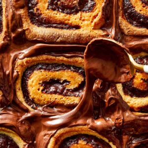 Close-up of Nutella rolls covered in melted Nutella ready to serve