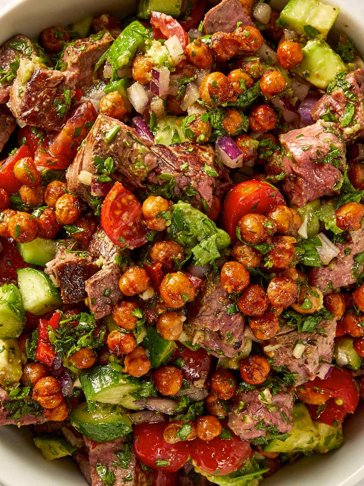 Close view of Steak and chickpea salad with chimichurri