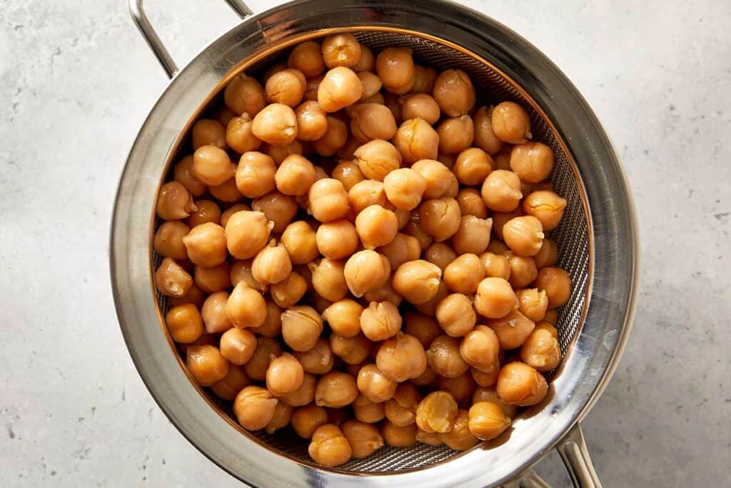Top overview of clean chickpea in a colander