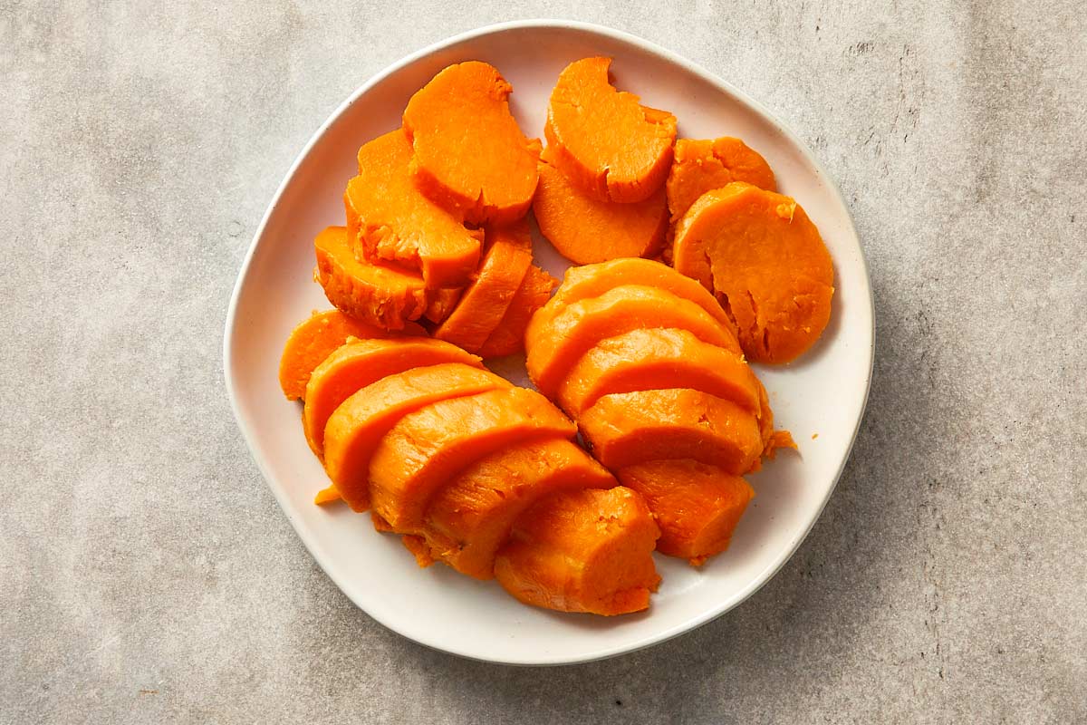 Overview top of baked sweet potatoes cut into pieces