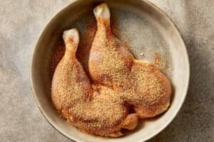 Seasoned chicken marylands for cabbage chicken soup coated with spices before cooking