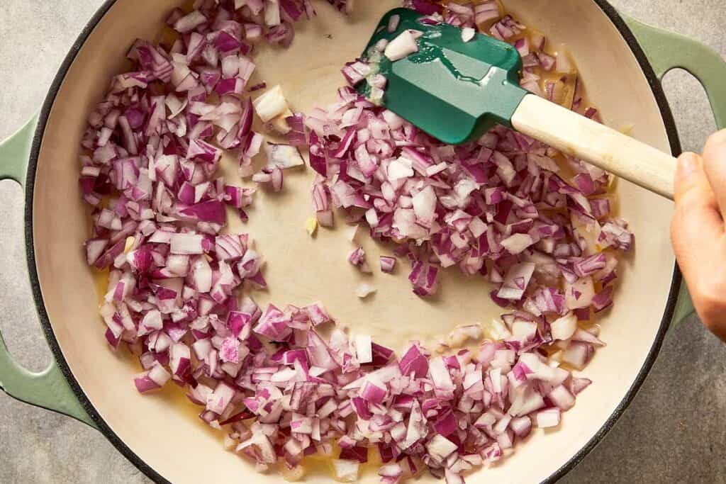 Onion in a pot with melted ghee