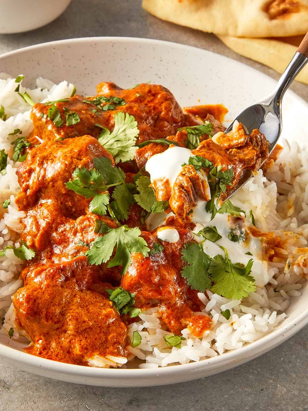 Lamb curry being served