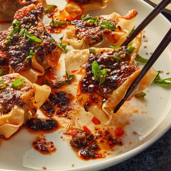Dumpling being hold ready to eat