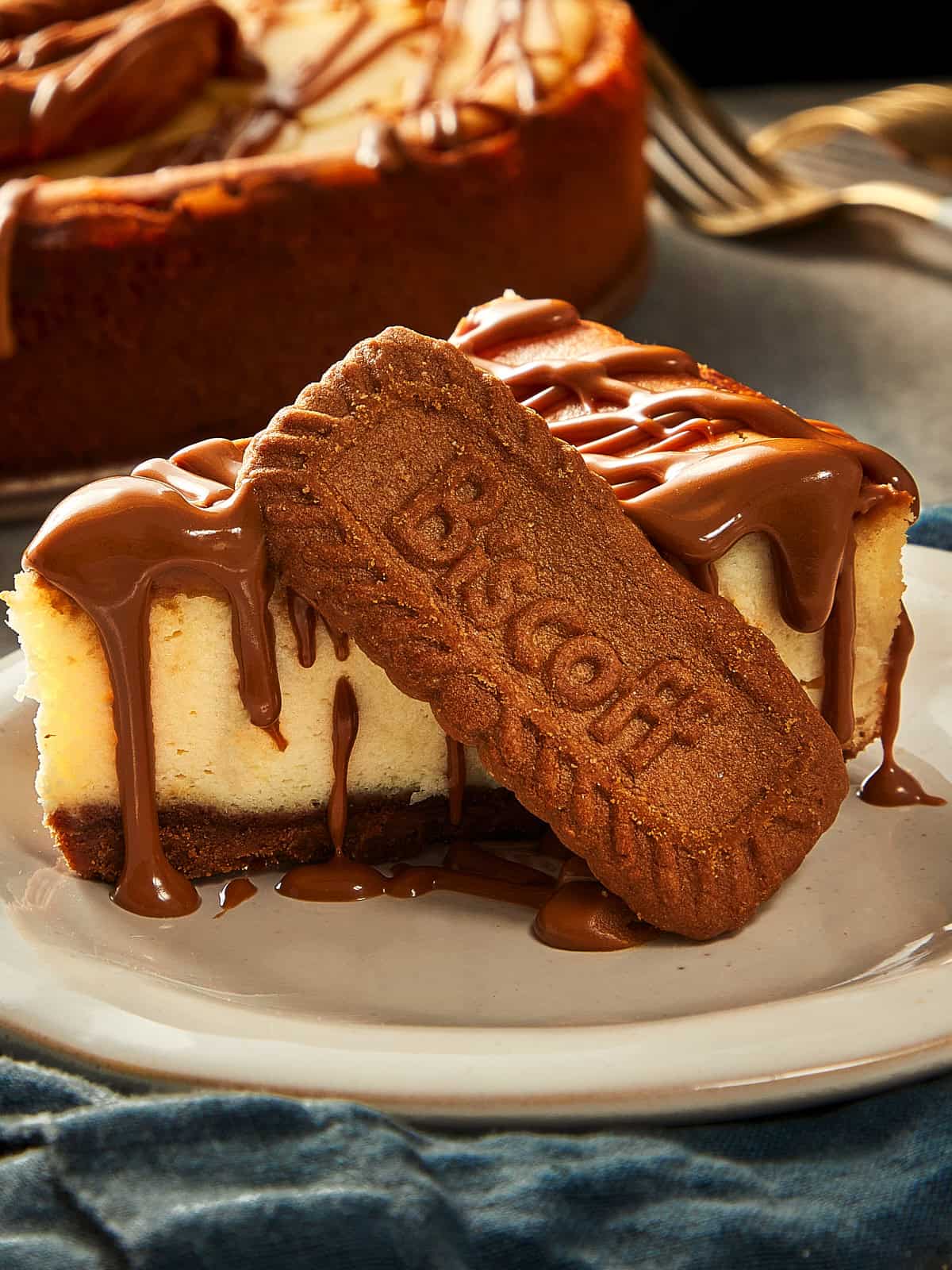 New York Cheesecake served with a biscuit 