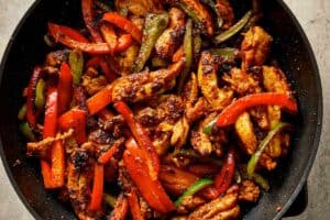 cooked chicken and veggies ready to assemble