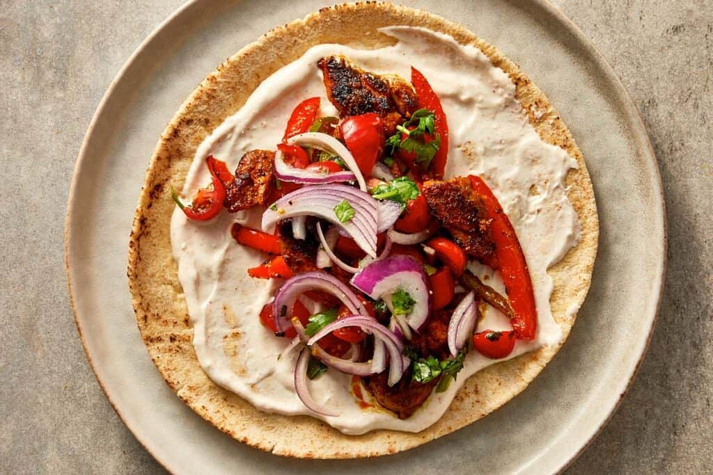 chicken wrap with the filling before toasting