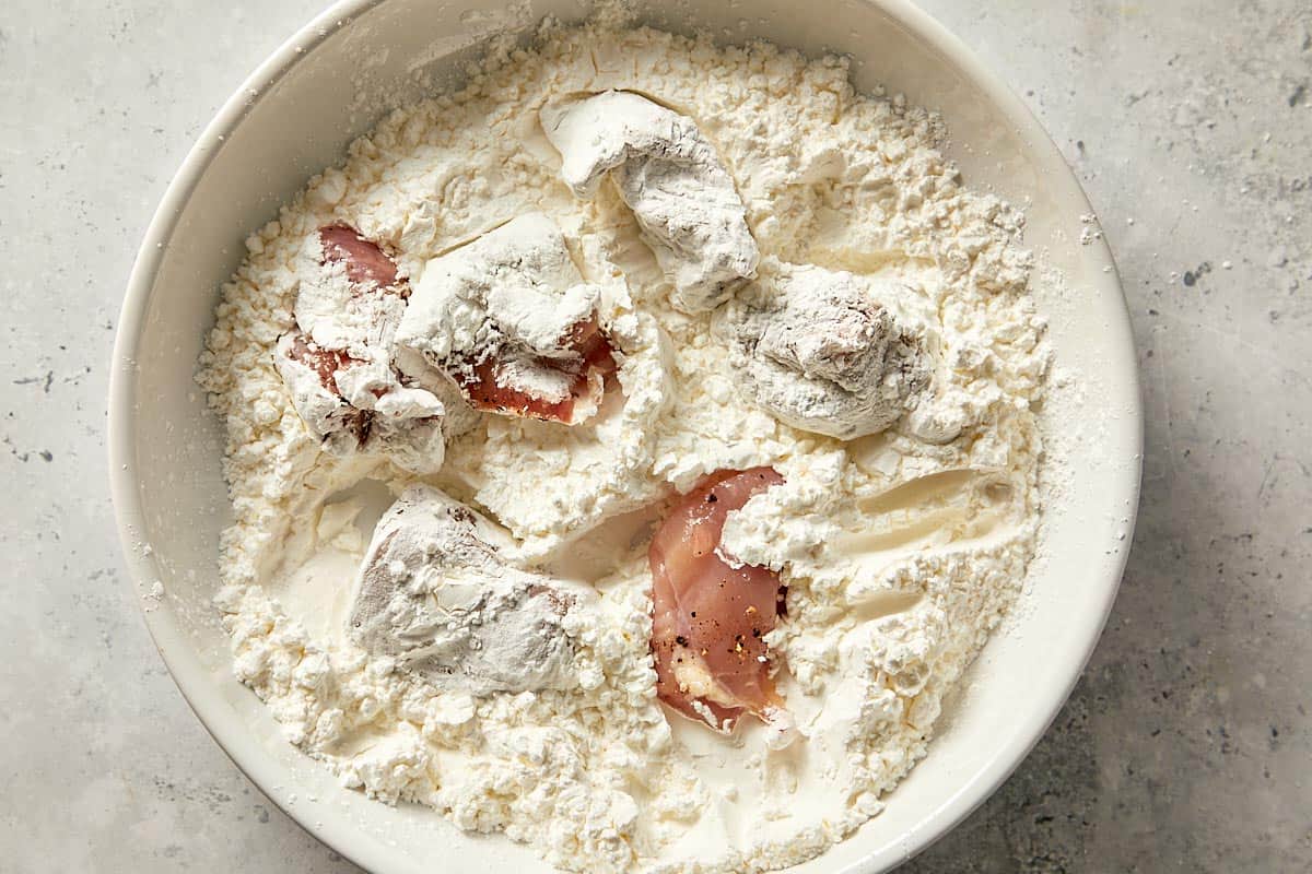 raw chicken in the cornstarch