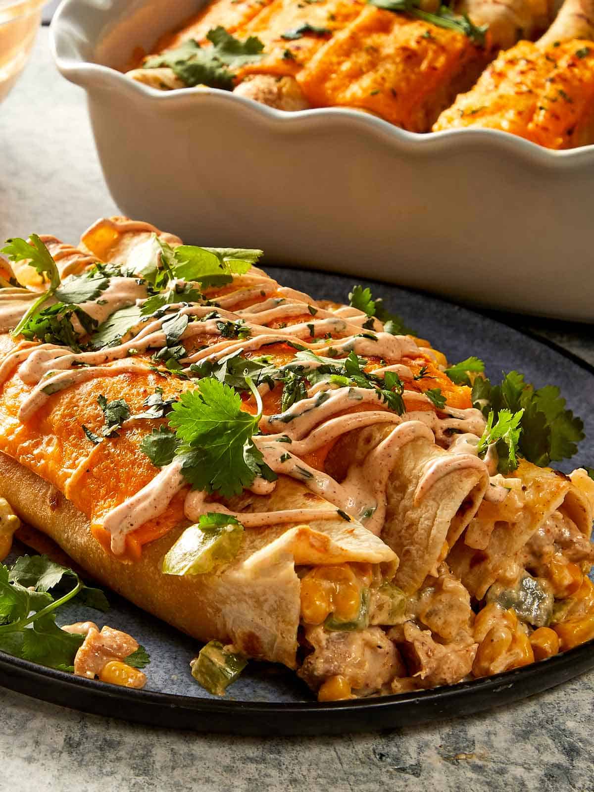 Baked Chicken Burritos on a plate ready to eat