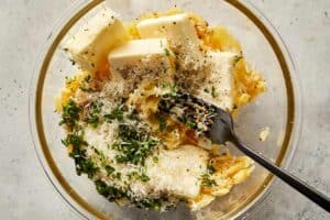 Ingredients in a bowl for garlic butter read