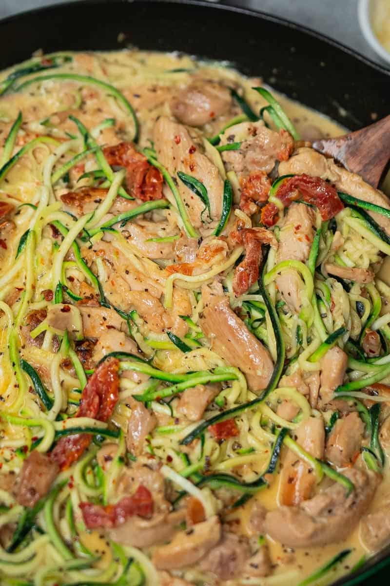 Creamy Sundried Tomato + Parmesan Chicken Zoodles in a bowl