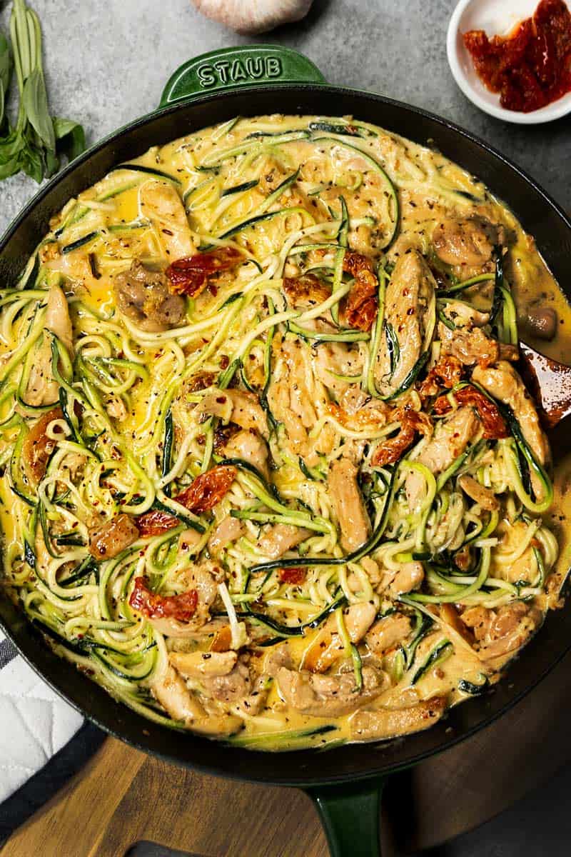 Creamy Sundried Tomato + Parmesan Chicken Zoodles in a pan