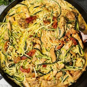 Creamy Sundried Tomato + Parmesan Chicken Zoodles in a pan