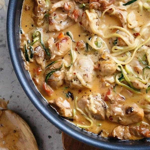 Creamy Sundried Tomato + Parmesan Chicken Zoodles in a pan