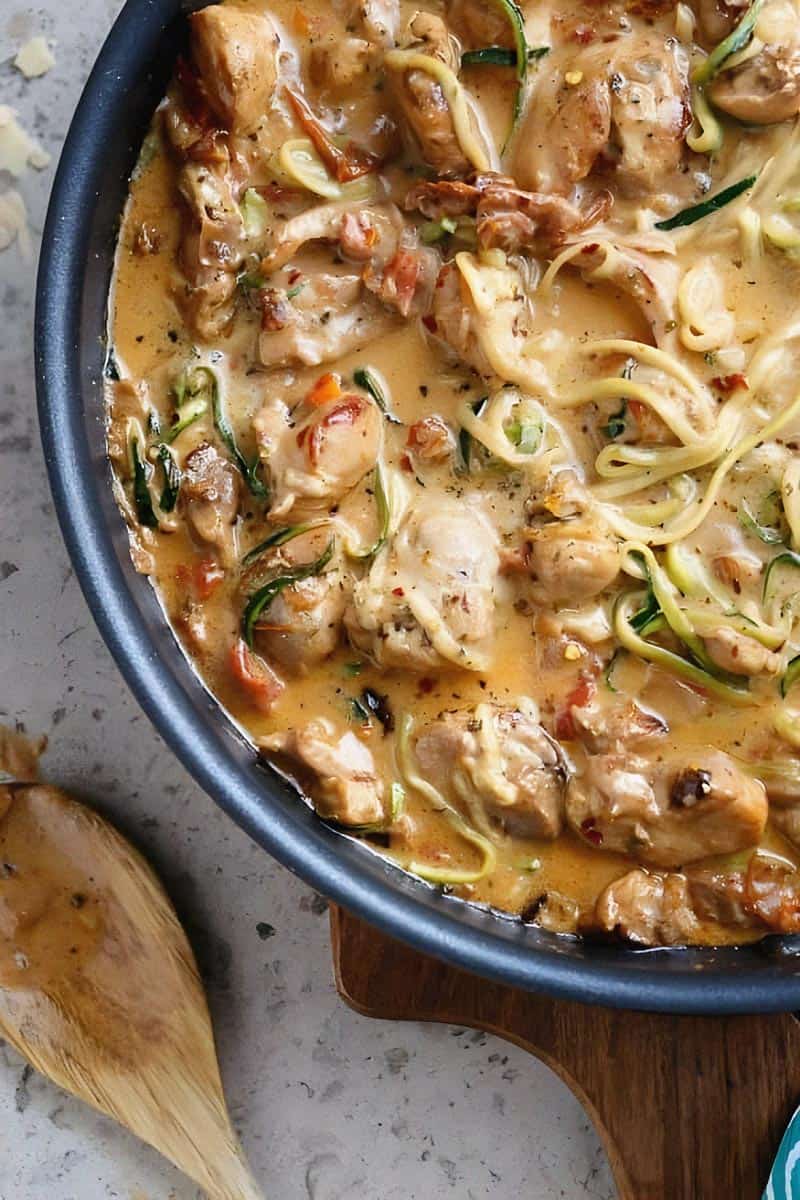 Creamy Sundried Tomato + Parmesan Chicken Zoodles in a pan