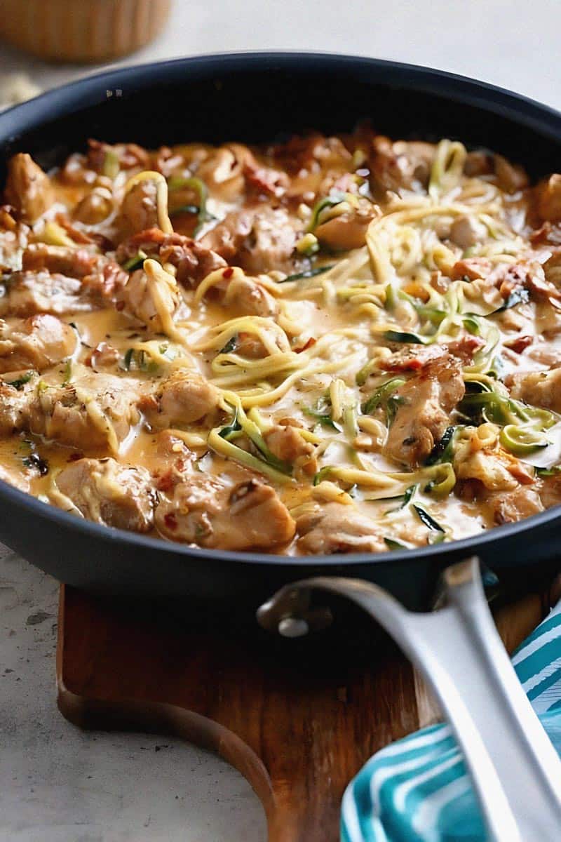 Creamy Sundried Tomato + Parmesan Chicken Zoodles in a bowl