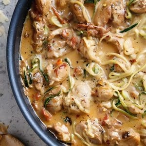Creamy Sundried Tomato + Parmesan Chicken Zoodles in a bowl