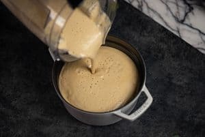 Transfering the soup to a bowl from the blender