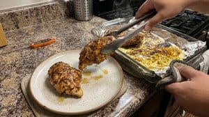 moving the chicken to a plate